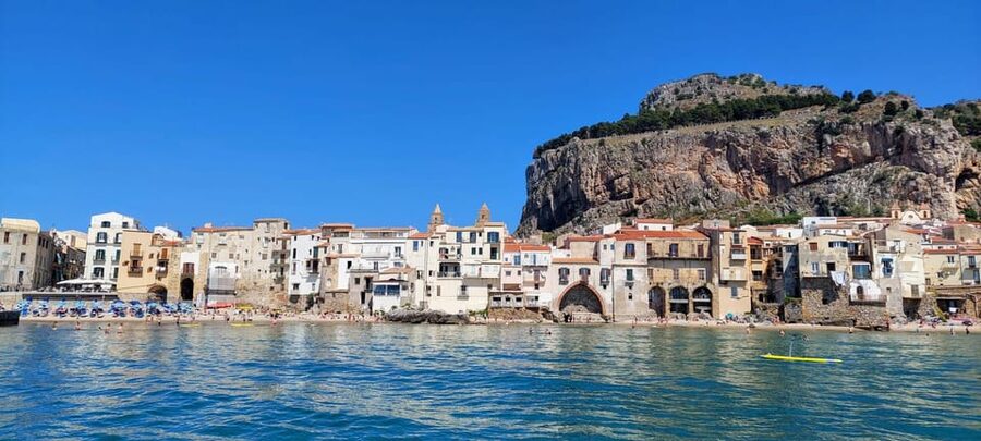 Cefalù: Mini Yacht with Snorkel Stops, Caves and Aperitif - Aperitivo on deck: prosecco, snacks, and a game