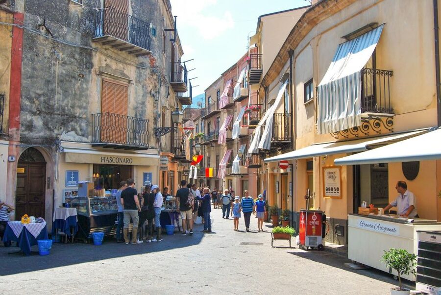 From Cefalù: Authentic Sicilian Villages and Happy Hour - Castelbuono: streets, Ventimiglia Castle, and panettone Fiasconaro