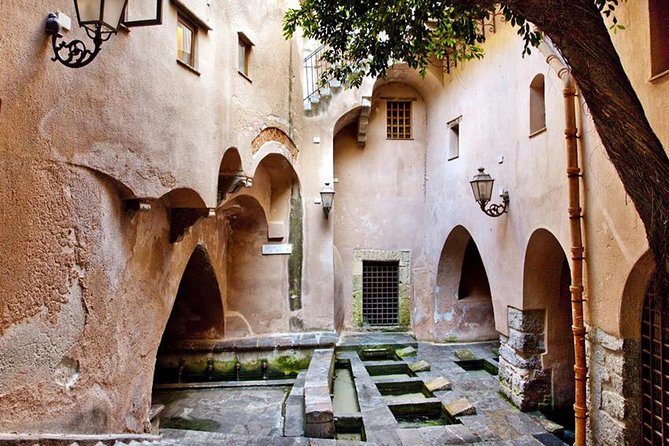 Monreale and Cefalù from Palermo, Private Tour - San Benedetto cloister: Romanesque columns and a palm-tree fountain