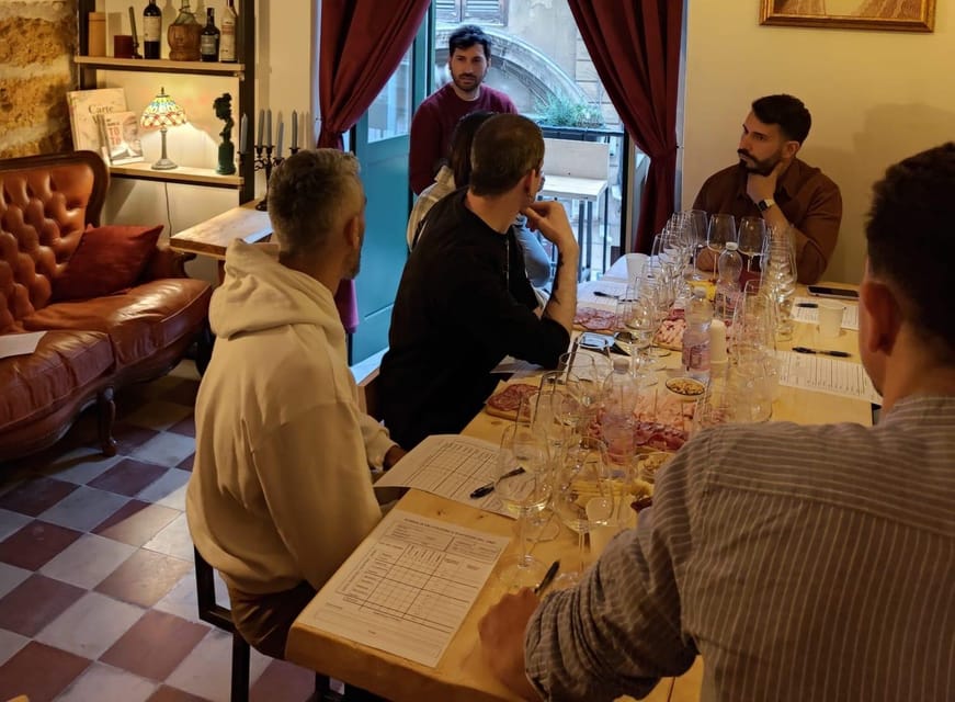 Palermo: Wine Tasting with Sicilian Tapas - Balcony sipping over a 1700s church: why the setting changes the wine
