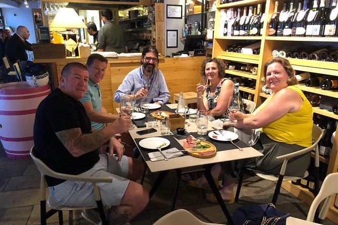 Private Sicilian Wine & Cheese Tasting - What you actually eat and taste: cheeses, ham, cookies, and dessert wine