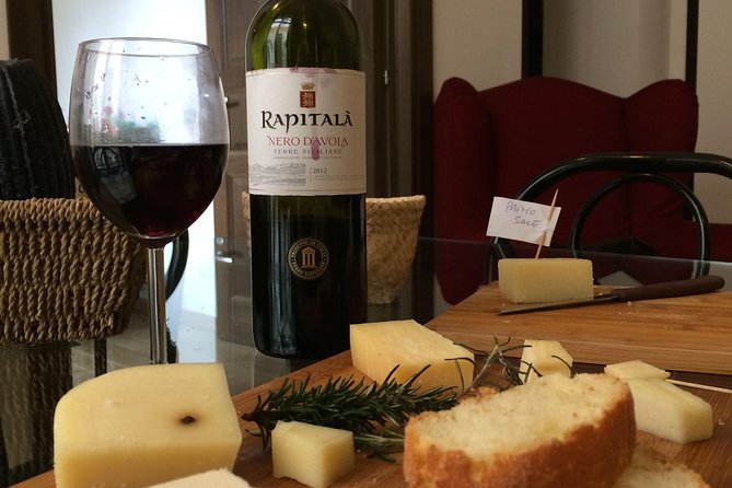 Sicilian Wines and cheeses Tasting in Palermo - The menu: caponata, artisan cheeses, cassata, and dessert wine